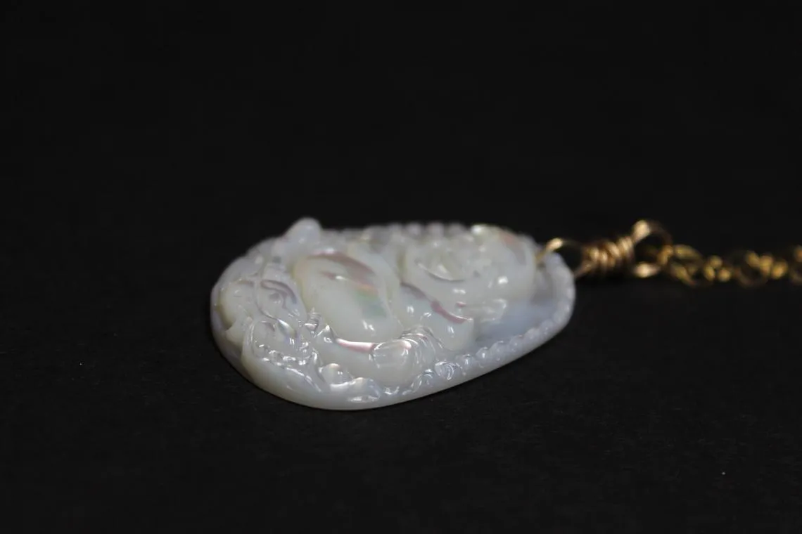 carved mop mother of pearl buddha necklace