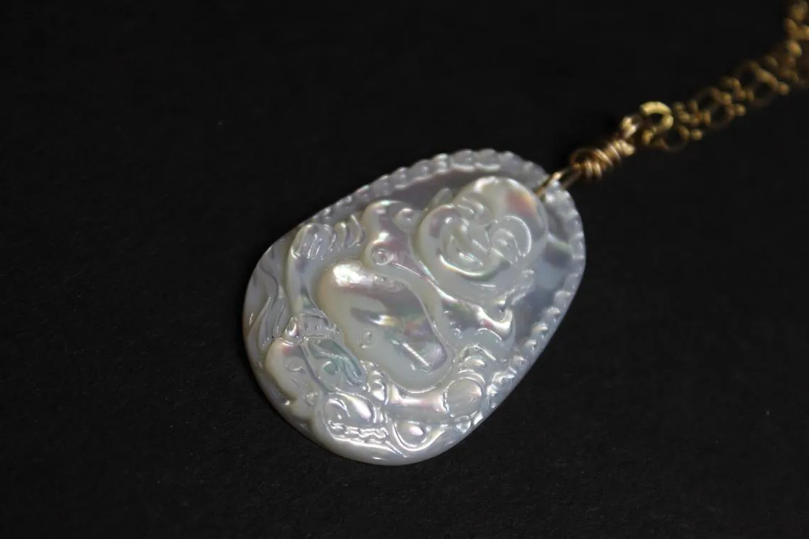 carved mop mother of pearl buddha necklace