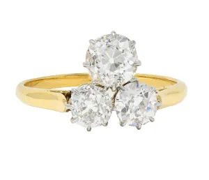 Edwardian 2.55 CTW Old Mine Diamond Platinum 18 Karat Yellow Gold Antique Three Stone Ring