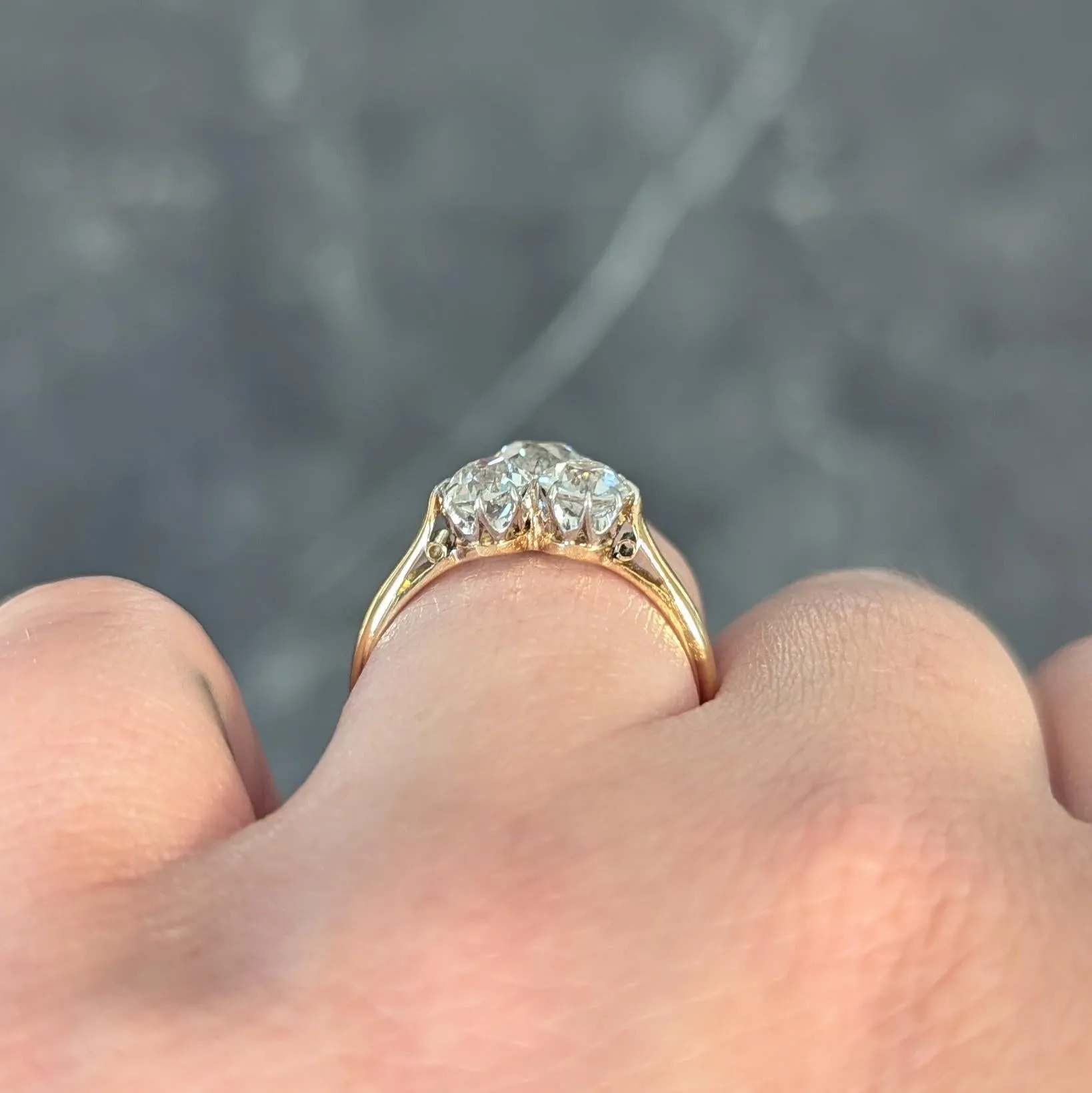 Edwardian 2.55 CTW Old Mine Diamond Platinum 18 Karat Yellow Gold Antique Three Stone Ring
