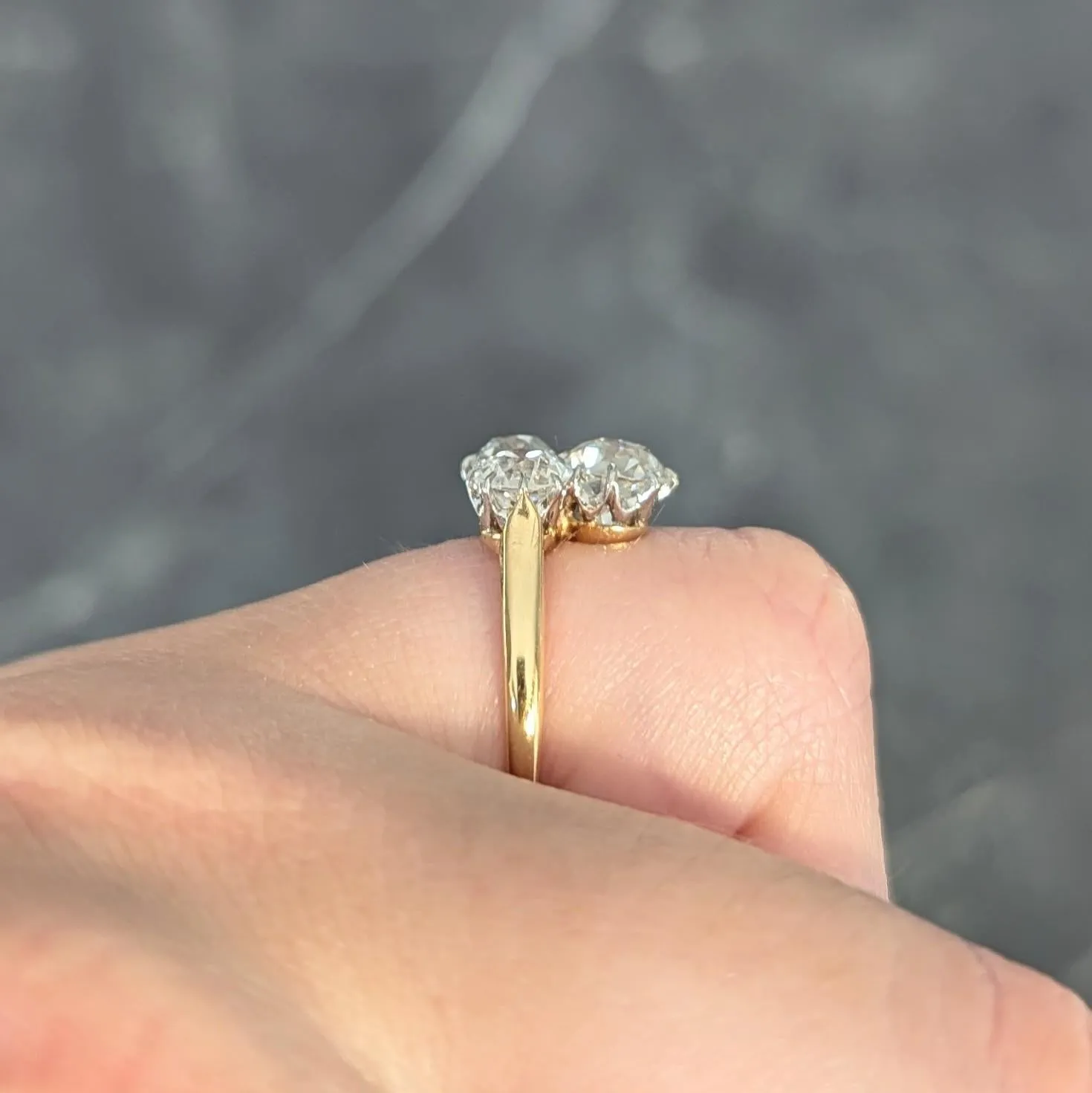 Edwardian 2.55 CTW Old Mine Diamond Platinum 18 Karat Yellow Gold Antique Three Stone Ring
