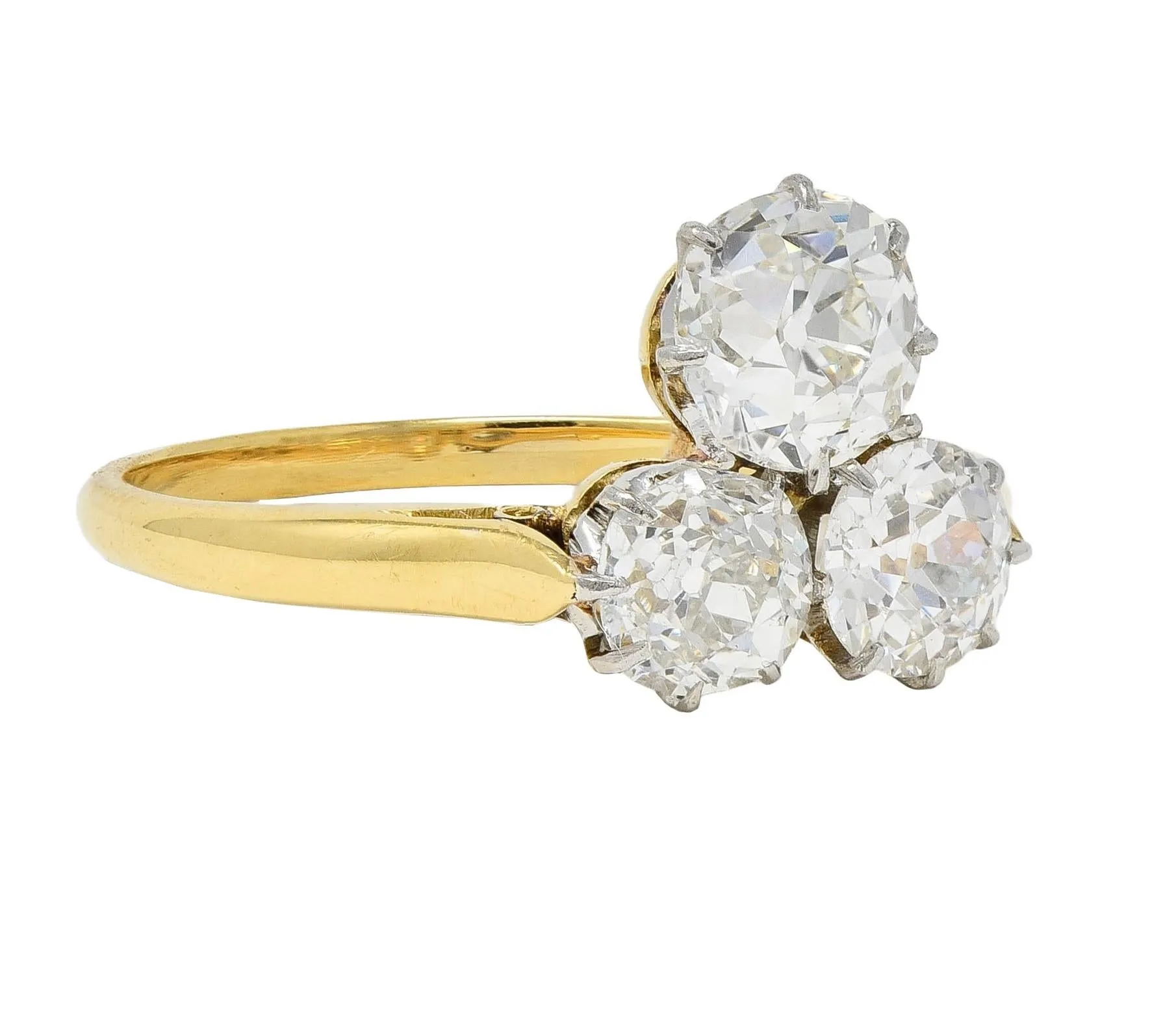 Edwardian 2.55 CTW Old Mine Diamond Platinum 18 Karat Yellow Gold Antique Three Stone Ring
