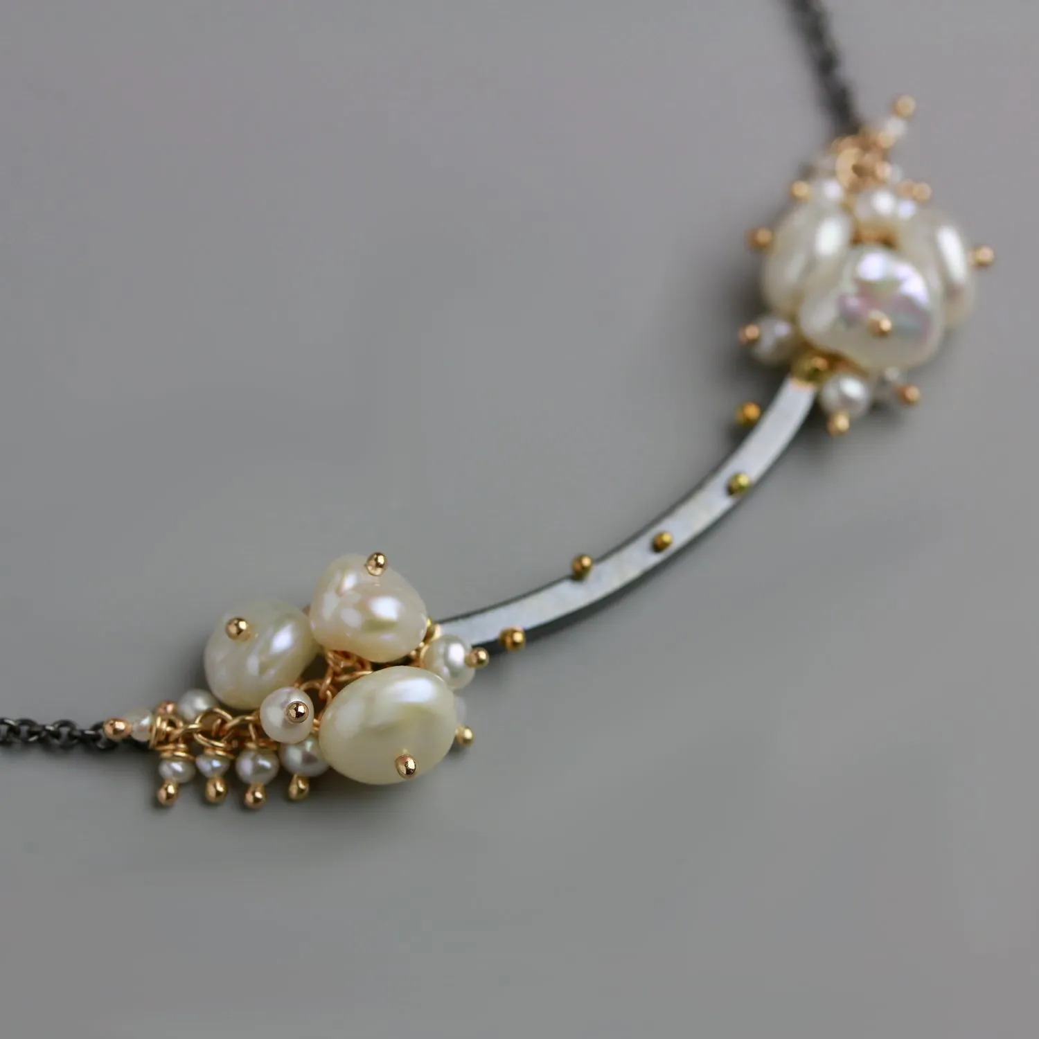 Gold Dotted Arc and Pearl Clusters