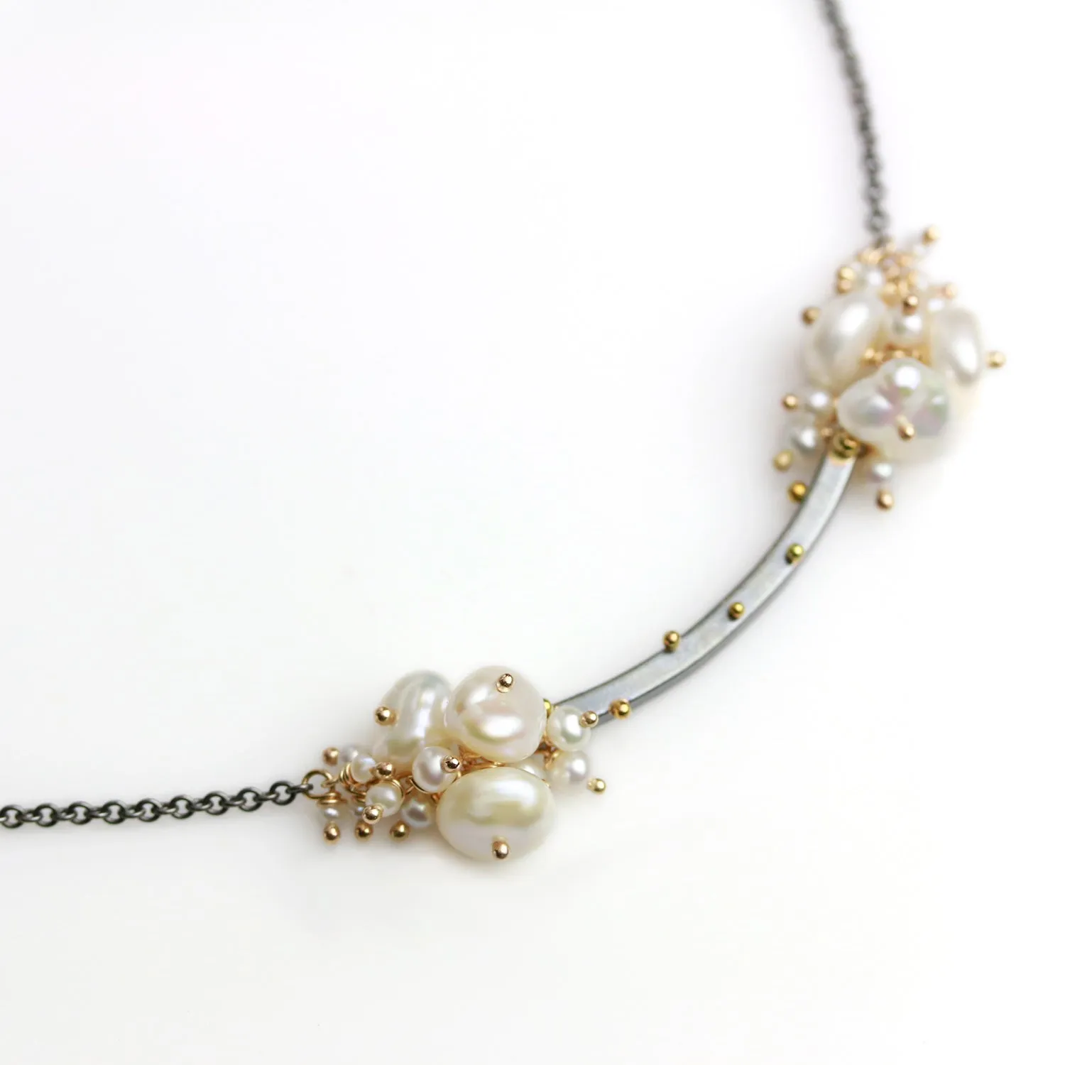 Gold Dotted Arc and Pearl Clusters