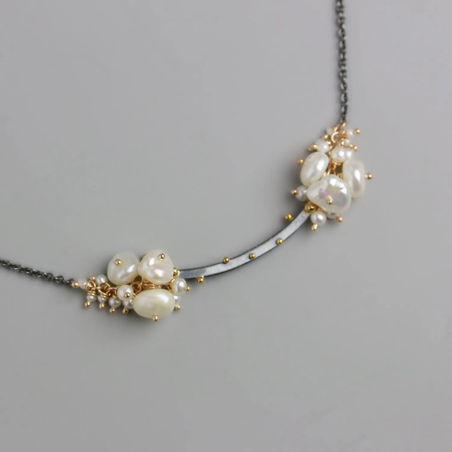 Gold Dotted Arc and Pearl Clusters
