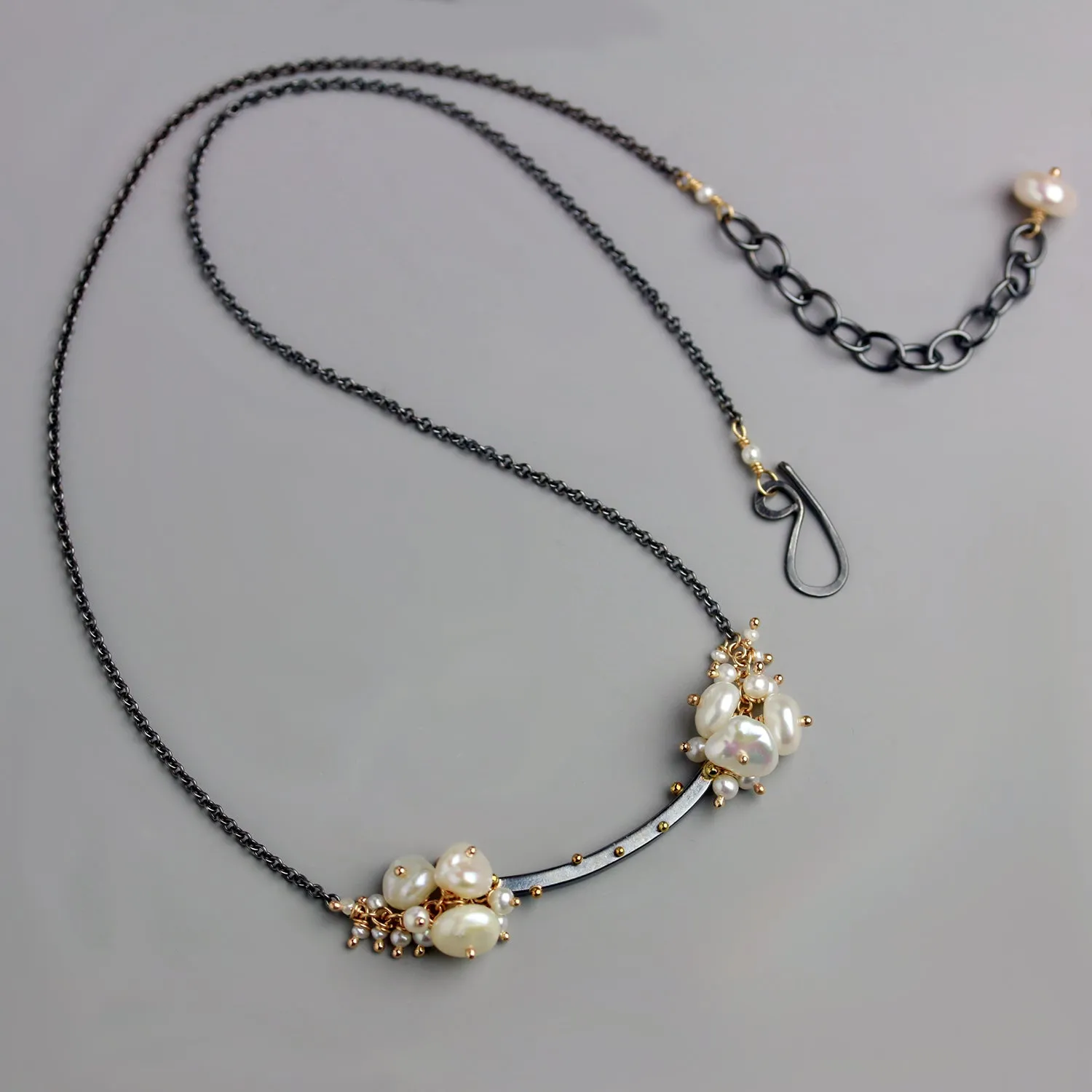 Gold Dotted Arc and Pearl Clusters