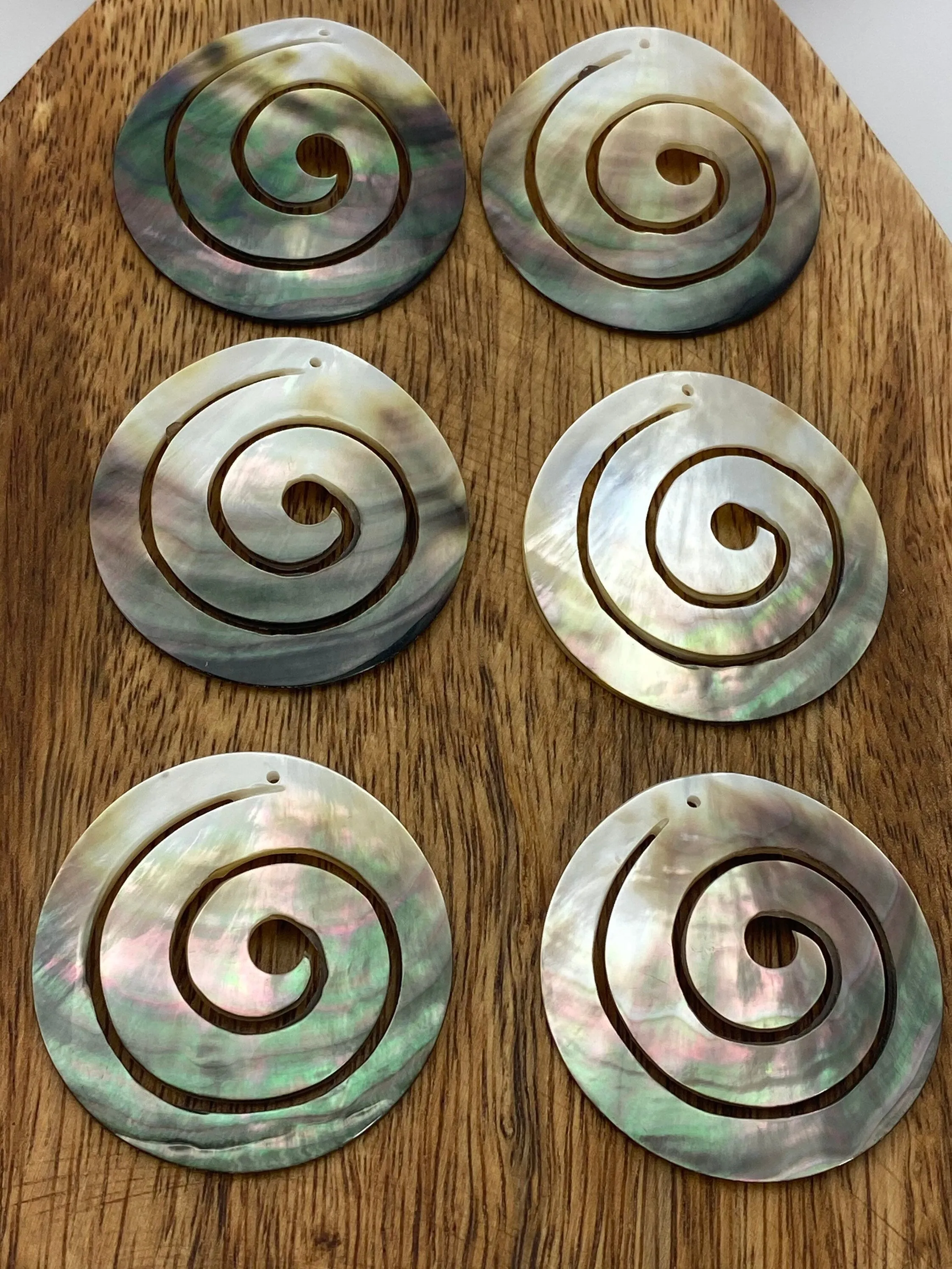 M66 Black Tahitian MOP Swirl
