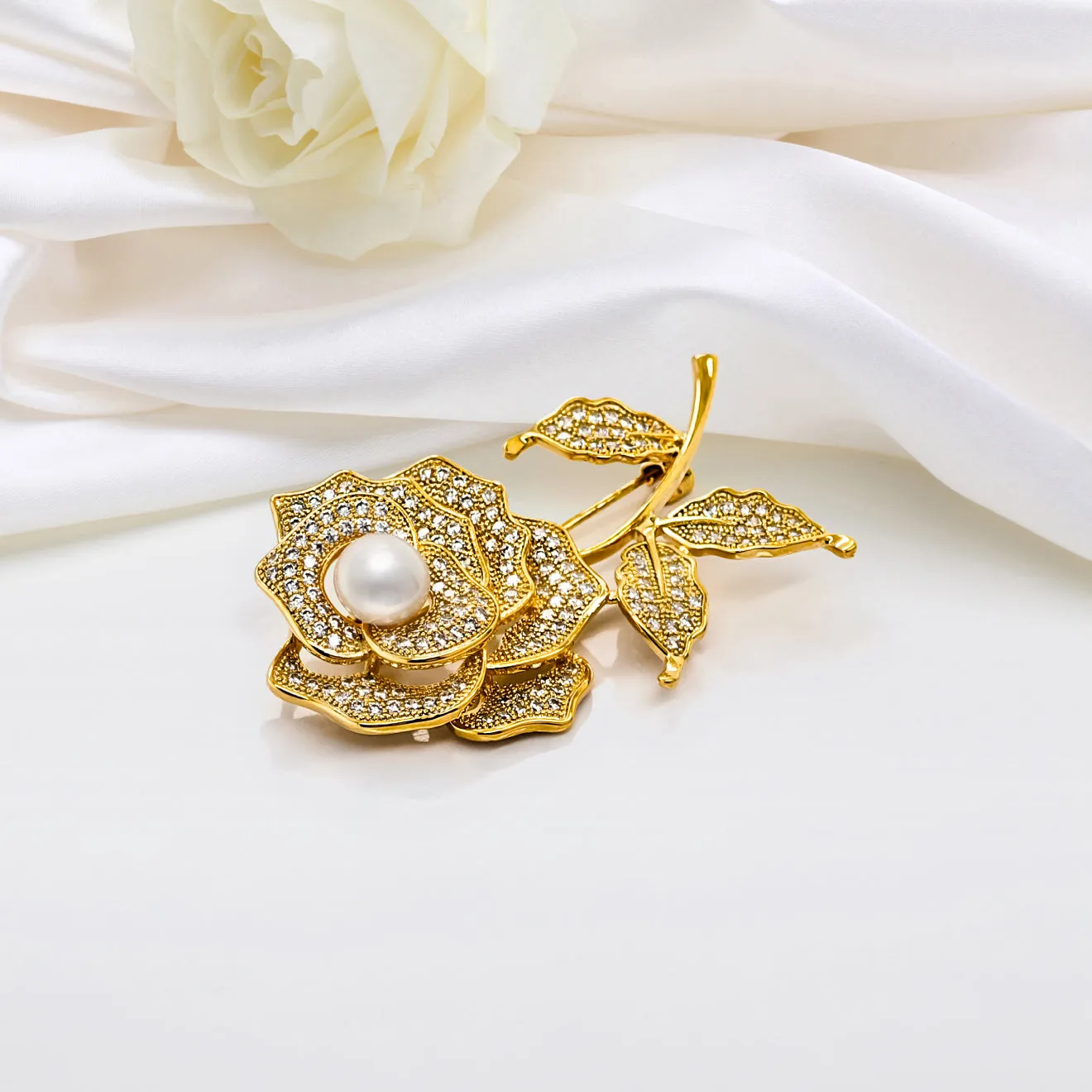 Regal Pearl Brooches