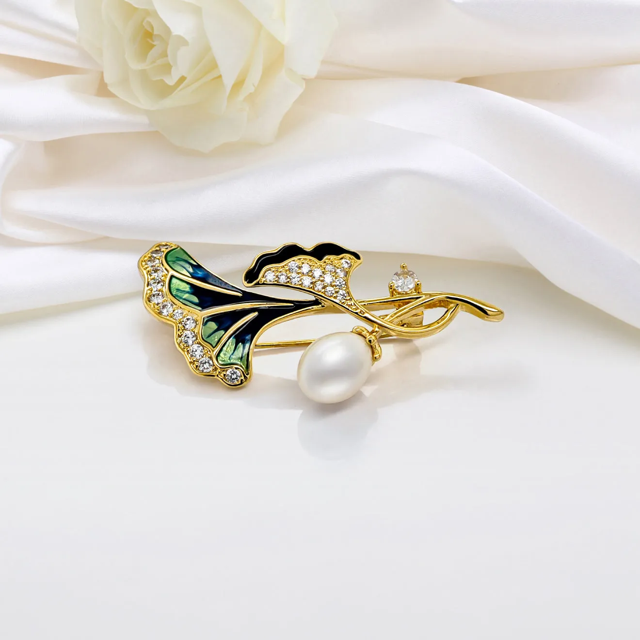 Regal Pearl Brooches