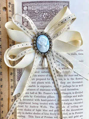 Vintage cameo and ribbon brooch.