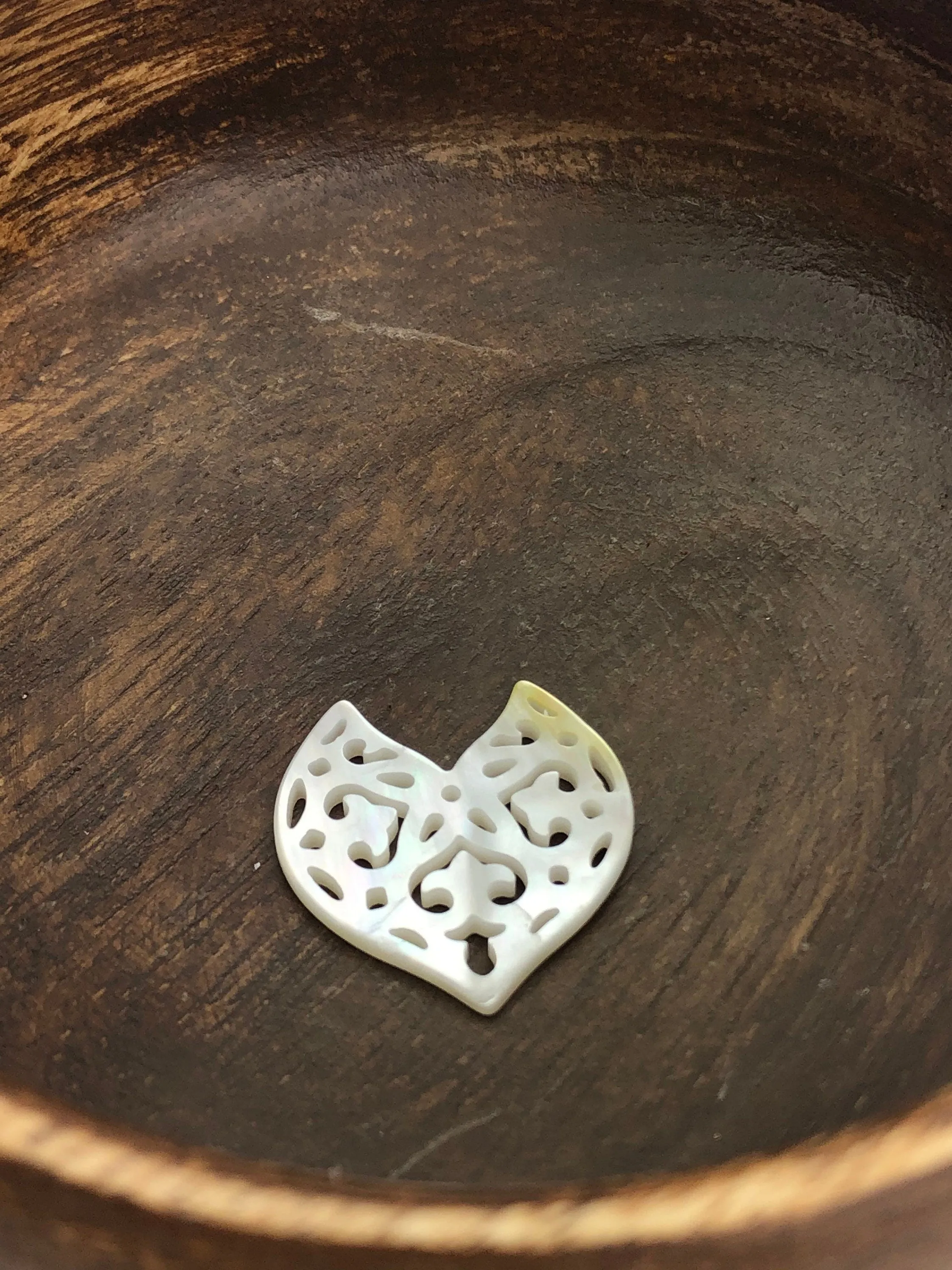 White carved Mother of Pearl Dolphin Tail